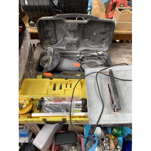 994 - Three items, one Wickes table saw, one Challenge Xtreme MAG6378 angle grinder and one cased laser le... 