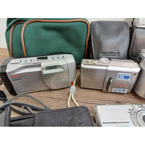 616 - A collection of Olympus digital cameras to include SP-510UZ 7.1mp, FE-190 6mp, Stylus 300, C-60 Zoom... 