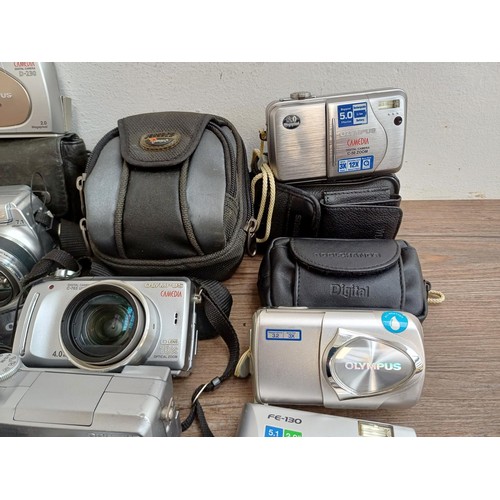 616 - A collection of Olympus digital cameras to include SP-510UZ 7.1mp, FE-190 6mp, Stylus 300, C-60 Zoom... 