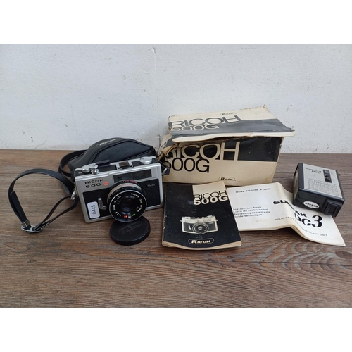 620 - Two items with instruction manuals, one boxed and cased 1970s Ricoh 500G 35mm compact coupled rangef... 