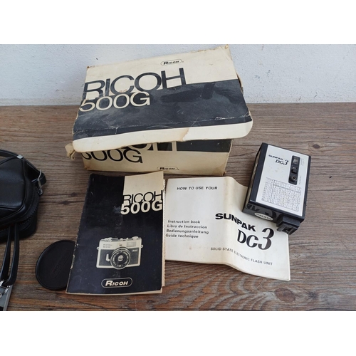 620 - Two items with instruction manuals, one boxed and cased 1970s Ricoh 500G 35mm compact coupled rangef... 