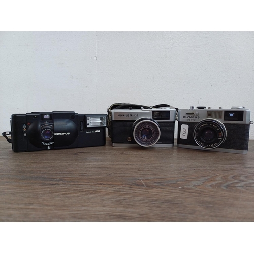 627 - Three Olympus 35mm compact cameras, one 35 RC fixed lens rangefinder, one cased Trip 35 fully-automa... 