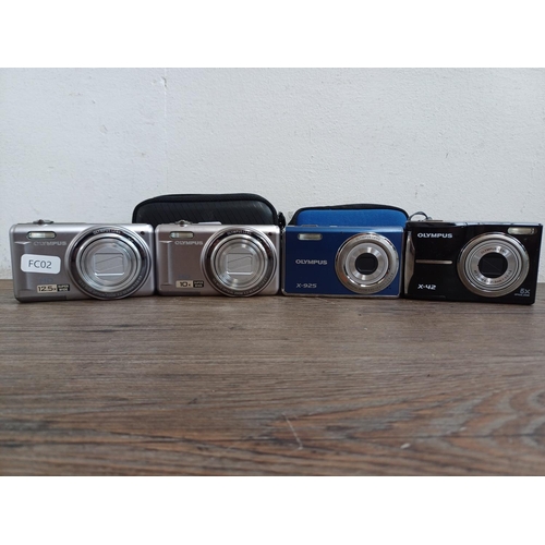 628 - Four Olympus compact digital cameras, one cased VR-310 14mp, one VR-325 14mp, one cased X-925 12mp a... 