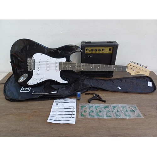 833 - A 3RD Ave electric guitar outfit comprising Stratocaster style guitar with tremolo arm, GA10 amplifi... 