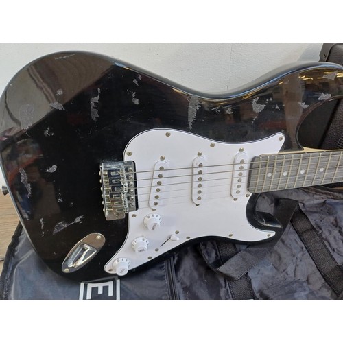 833 - A 3RD Ave electric guitar outfit comprising Stratocaster style guitar with tremolo arm, GA10 amplifi... 