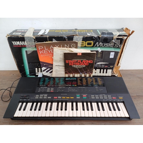 839 - A boxed Yamaha PortaSound PSS-480 Music Station  forty-nine mini-key electronic keyboard with midi i... 