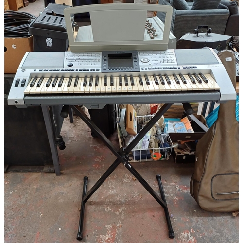 843 - A Yamaha PSR-3000 sixty-one key 'Arranger Workstation' electronic keyboard with stand