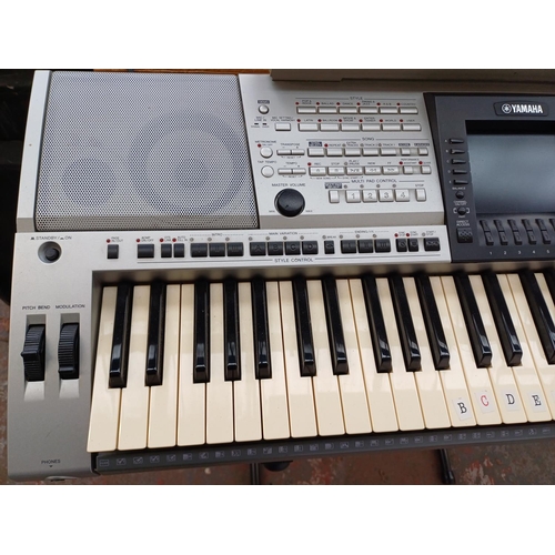 843 - A Yamaha PSR-3000 sixty-one key 'Arranger Workstation' electronic keyboard with stand