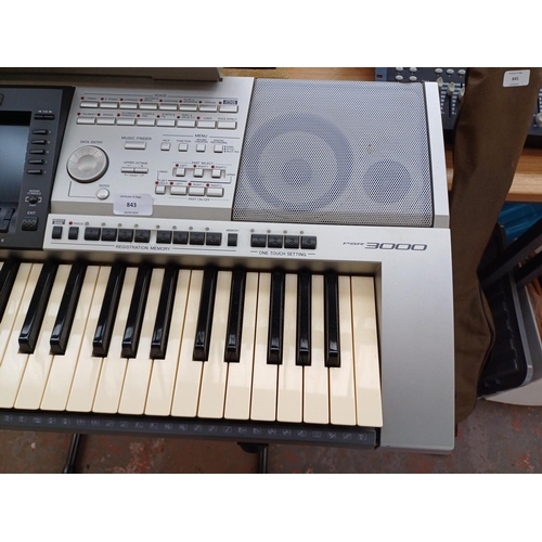 843 - A Yamaha PSR-3000 sixty-one key 'Arranger Workstation' electronic keyboard with stand