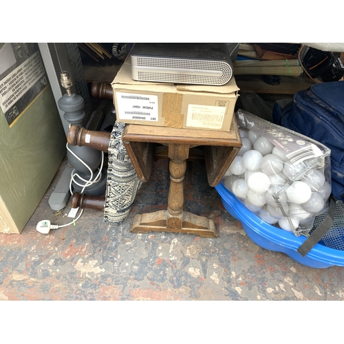 1029 - A large collection of house clearance items to include garden tools, chicken wire, fibrewood underla... 