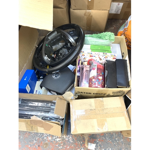 1034 - A collection of house clearance items to include sealed Stanley Allen keys, MG steering wheel, seale... 