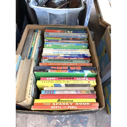 1038 - Six boxes containing a large collection of vintage annuals to include Dandy, Beano etc.