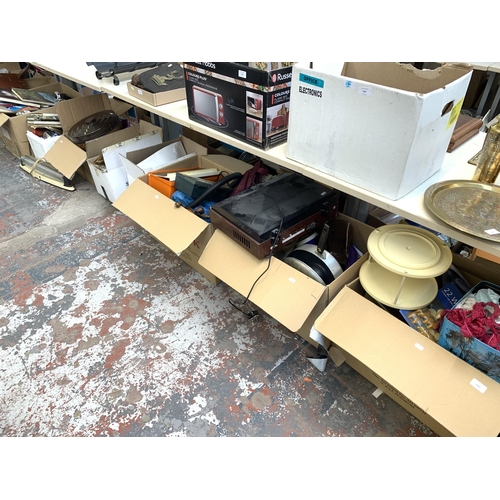 1061 - A large collection of house clearance items to include kitchenware, tools, lace material etc.