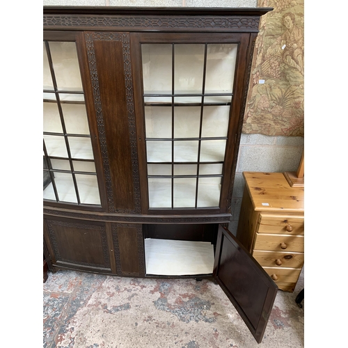 22 - An early 20th century carved mahogany display cabinet - approx. 177cm high x 139cm wide x 43cm deep