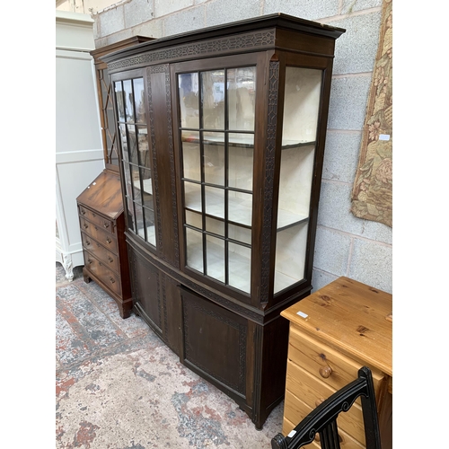 22 - An early 20th century carved mahogany display cabinet - approx. 177cm high x 139cm wide x 43cm deep