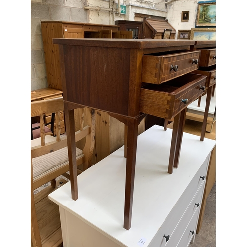 62 - A pair of Edwardian style inlaid mahogany two drawer bedside tables - approx. 67cm high x 48cm wide ... 