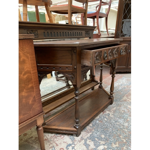 71 - An Old Charm carved oak console table - approx. 77cm high x 107cm wide x 33cm deep