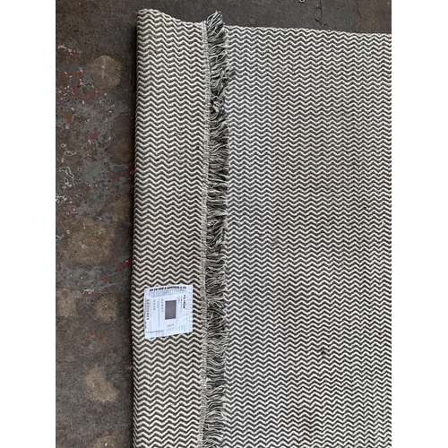 79 - An IKEA Filskov rug - approx. 240cm x 170cm