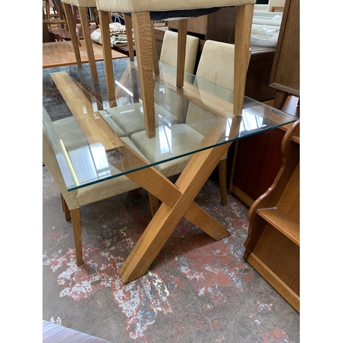 80 - A modern glass top and oak rectangular dining table and six suede chairs - table approx. 76cm high x... 