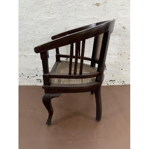 88 - A 19th century style hardwood and rattan bergère armchair - approx. 86cm high x 61cm wide x 52cm dee... 