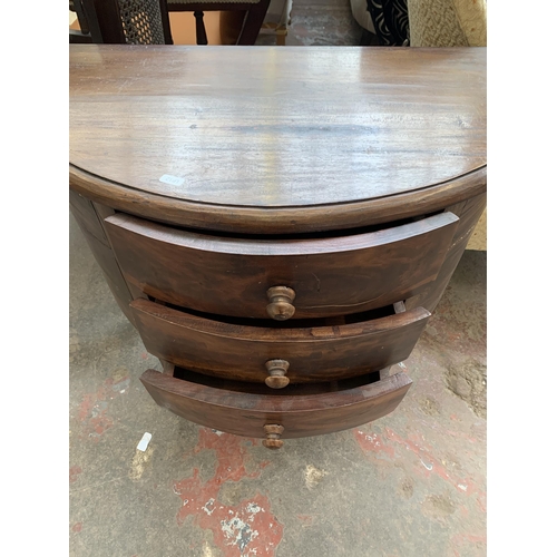 90 - An Indian sheesham wood demi lune chest of drawers - approx. 70cm high x 80cm wide x 39cm deep