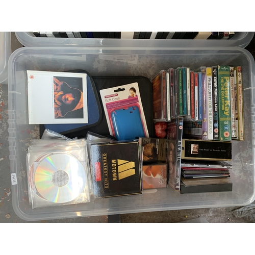 848 - Four boxes containing a collection of DVDs and CDs to include The Killing II, Ghostbusters 1 & 2, Da... 