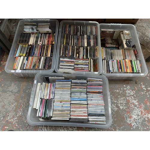 849 - Four boxes containing a collection of CDs to include The Smiths, Paul Weller, Talk Talk, The Style C... 