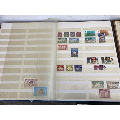 Three albums containing world wide stamps to include Nigeria, Mauritius ...