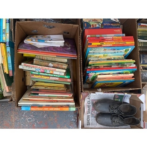 1058 - Eleven boxes containing postcards, sheet music, Ladybird books, Enid Blyton Noddy books etc.