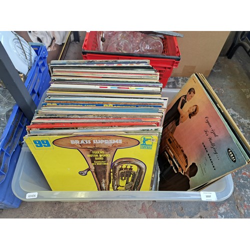 1037 - Five boxes containing ceramics, glassware, LP vinyl records etc.