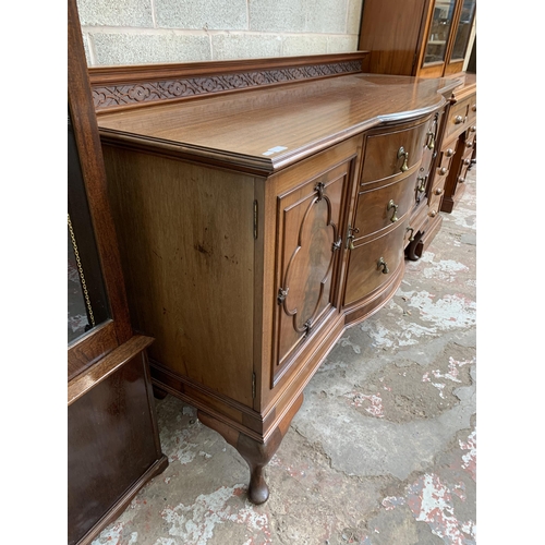 6 - An Edwardian carved mahogany bow fronted sideboard on cabriole supports - approx. 110cm high x 182cm... 