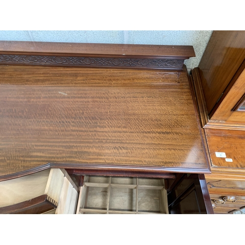 6 - An Edwardian carved mahogany bow fronted sideboard on cabriole supports - approx. 110cm high x 182cm... 