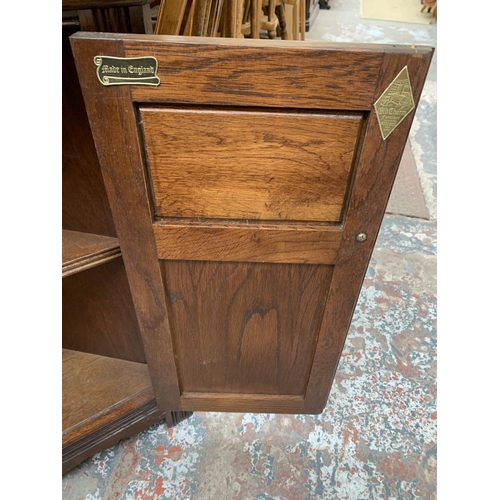 22 - An Old Charm carved oak and lead glazed free standing corner cabinet - approx. 167cm high