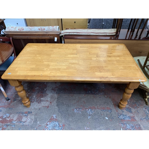 106 - A modern beech rectangular dining table - approx. 76cm high x 100cm wide x 184cm long