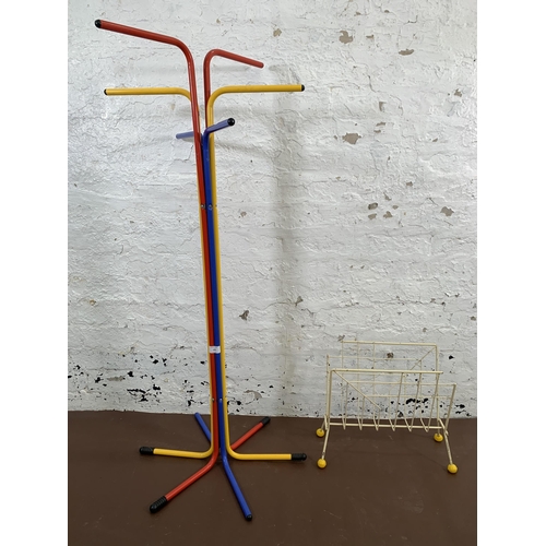 122 - Two pieces of furniture, one mid 20th century wired metal atomic sputnik magazine rack and one multi... 