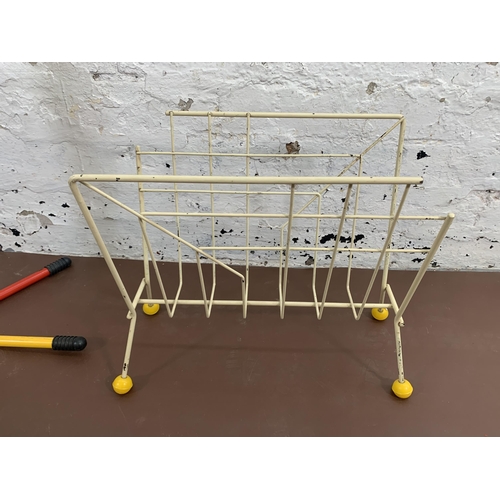 122 - Two pieces of furniture, one mid 20th century wired metal atomic sputnik magazine rack and one multi... 