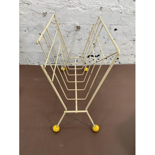 122 - Two pieces of furniture, one mid 20th century wired metal atomic sputnik magazine rack and one multi... 