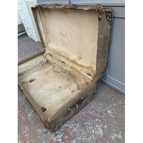 141 - An early 20th century wooden banded fibreboard travel trunk