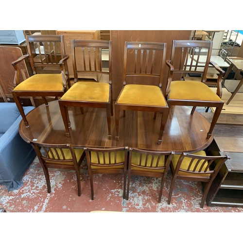 199 - A Georgian style mahogany D end extending dining table and eight chairs