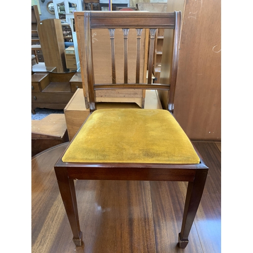 199 - A Georgian style mahogany D end extending dining table and eight chairs