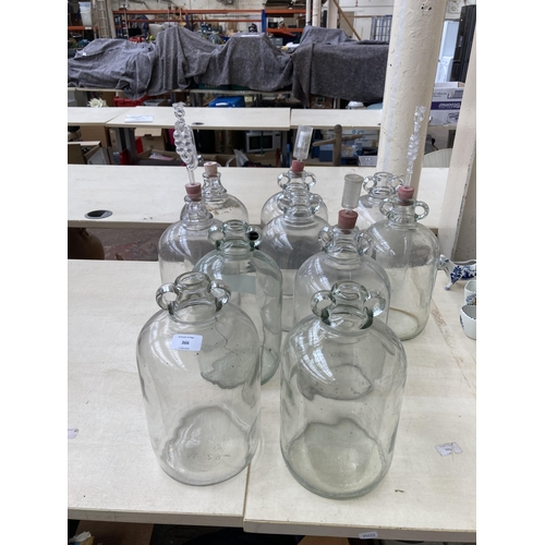 366 - Ten glass demijohns - approx. 30cm high