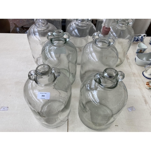 366 - Ten glass demijohns - approx. 30cm high