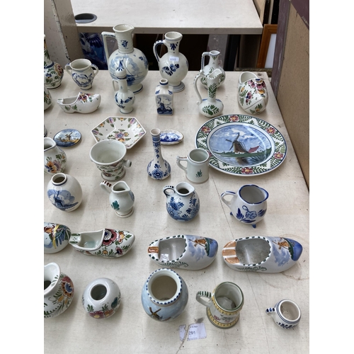 367 - A collection of Delft hand painted ceramics to include jugs, cow creamer, shoe ashtrays etc.