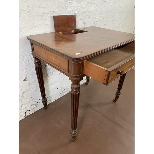 1 - An early 19th century Gillows of Lancaster mahogany chamber table with pen compartment, fluted suppo... 