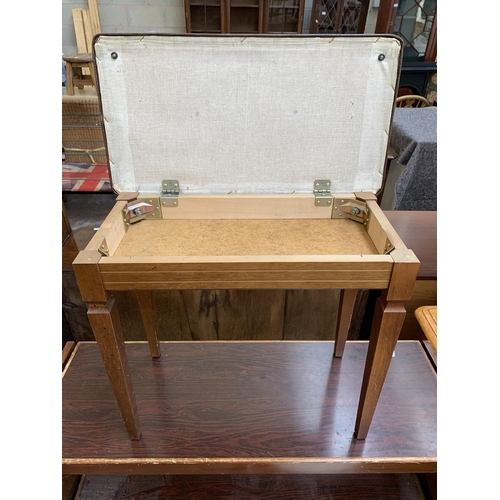 102 - A mid 20th century brown vinyl upholstered and teak piano stool