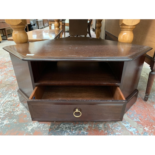 107A - A Stag Minstrel mahogany corner TV stand