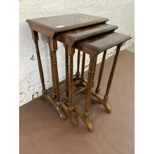 113 - An Edwardian style beech nest of tables