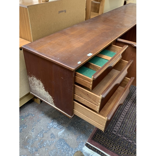 114 - A mid 20th century Stonehill Furniture Ltd teak sideboard - approx. 75cm high x 212cm wide x 44cm de... 