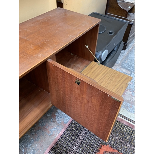 114 - A mid 20th century Stonehill Furniture Ltd teak sideboard - approx. 75cm high x 212cm wide x 44cm de... 