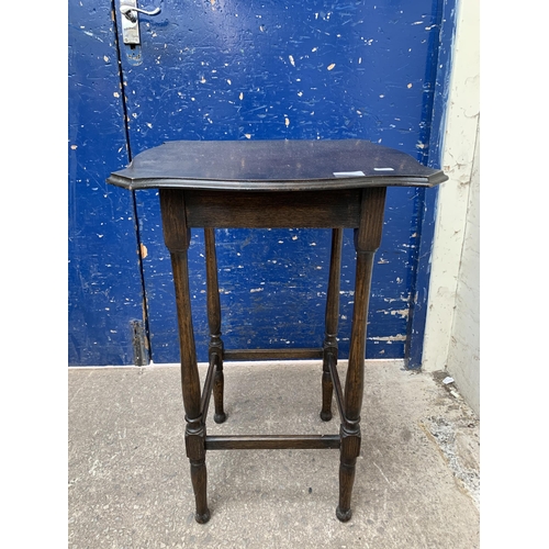 126 - An early/mid 20th century oak serpentine side table